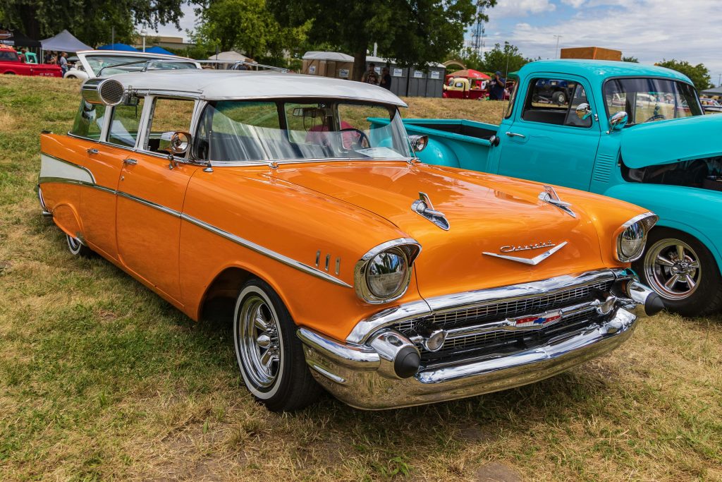 Vintage orange Chevrolet Bel Air displayed at a car show in Modesto, California.